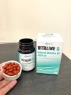 Viên Vitaline D3 màu hổ phách nhỏ xíu trên nắp lọ